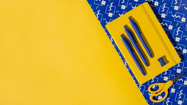 Top view school supplies on the table assortment