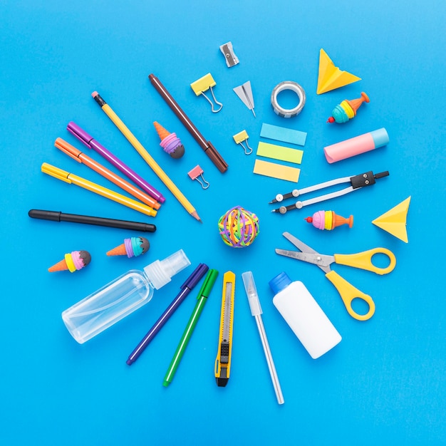 Free photo top view of school supplies with pencils and scissors