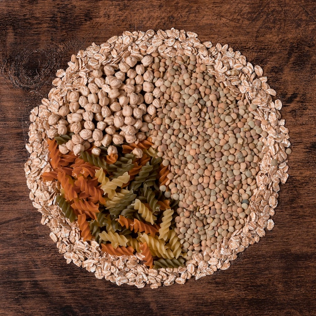 Free photo top view seeds and pasta arrangement