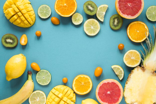 Top view selection of fresh and tasty fruits on the table