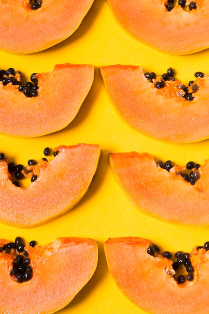 Free Photo top view selection of tasty papayas