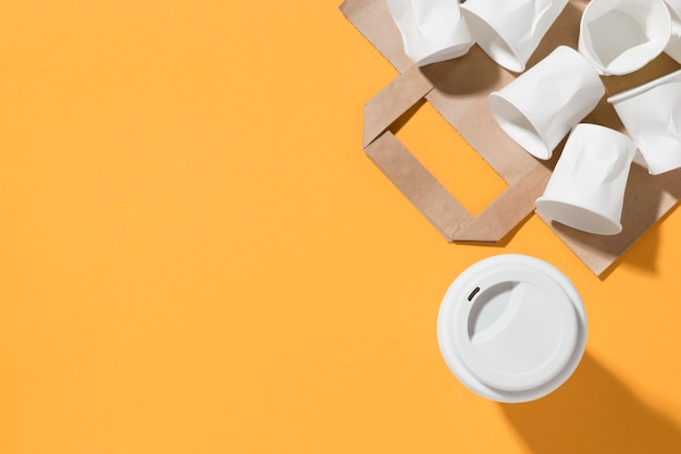 Top view set of plastic cups on the table