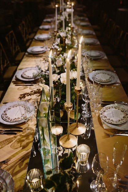 Free Photo top view of the set table decorated with flowers and candles