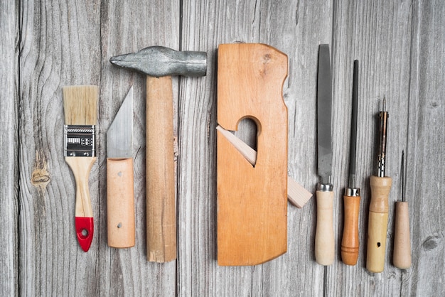 Top view set of tools on wooden table