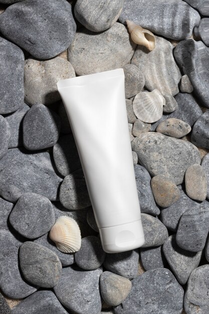 Free Photo top view skincare product on the beach