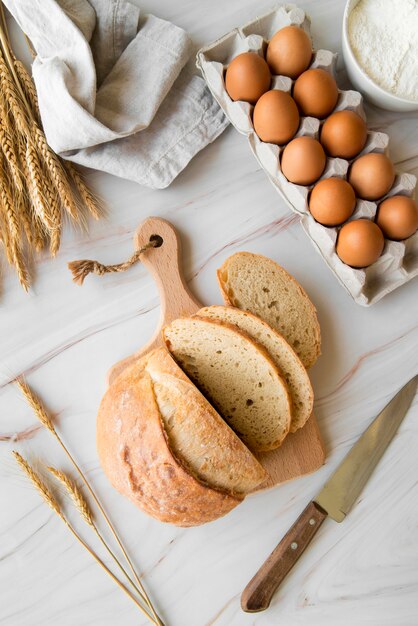 Top view sliced bread and eggs