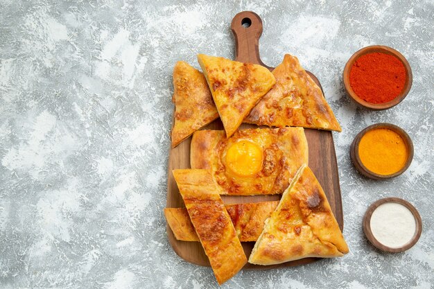 Top view sliced egg pastry baked bread on a white background pastry dough food meal bread bun