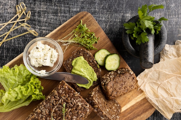 Free Photo top view of slices bread for sandwiches with salad