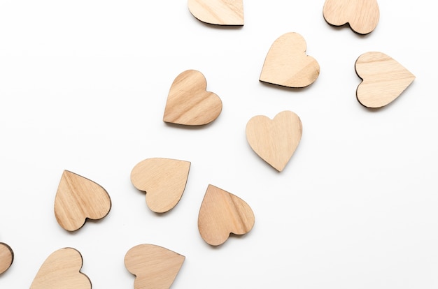 Free photo top view small wooden heart collection