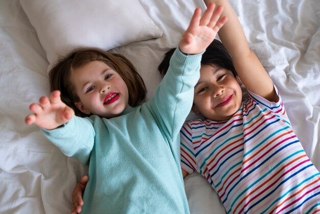 Top view smiley kids playing together