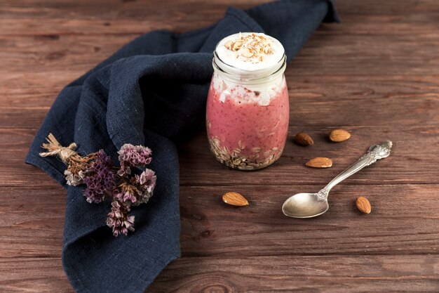 Free photo top view smoothie on wooden table