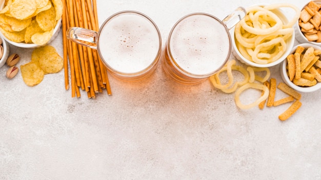 Top view snacks and beer arrangement