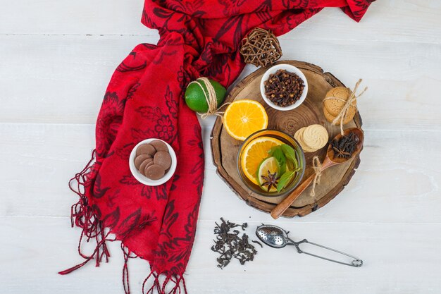 Top view of snacks with herbal tea