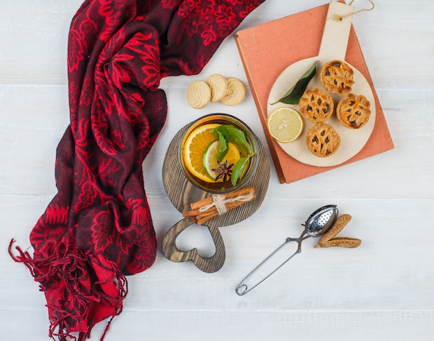 Top view of snacks with herbal tea