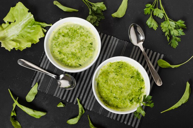 Top view of soup bowls with parsley