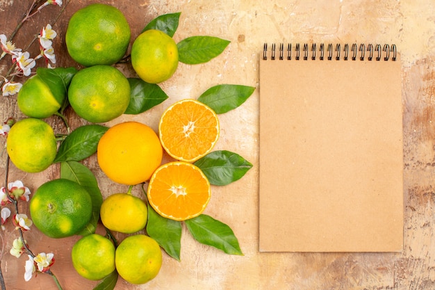 Top view sour green tangerines on light background