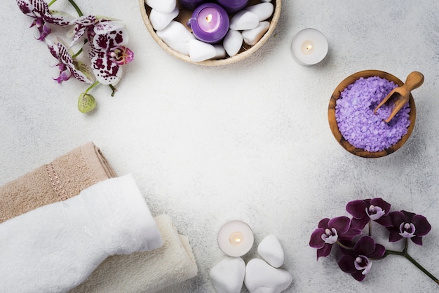 Top view spa towels and salt on the table