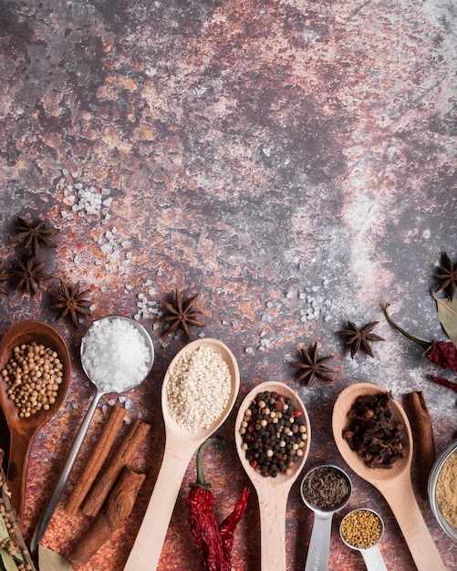 Top view spices on rusty background