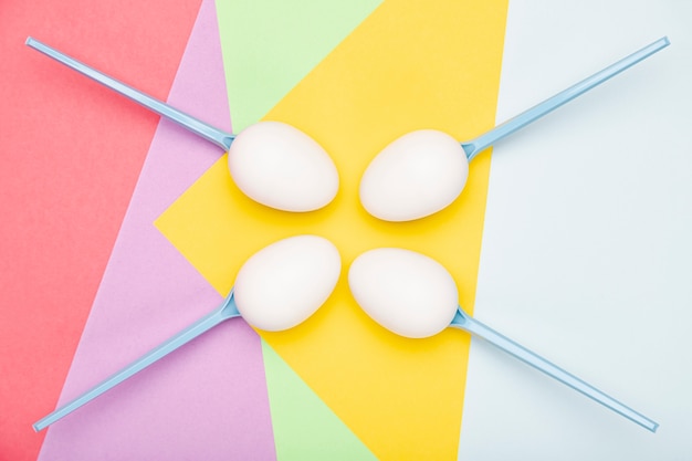 Top view spoons with eggs