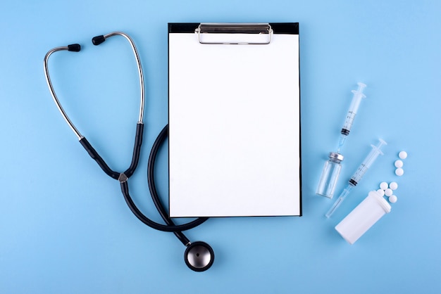 Top view stethoscope and clipboard arrangement