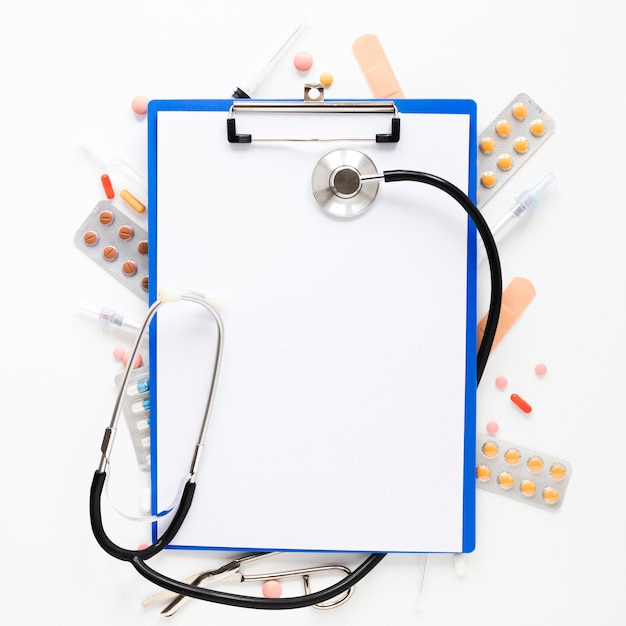 Top view stethoscope with medicine tablets