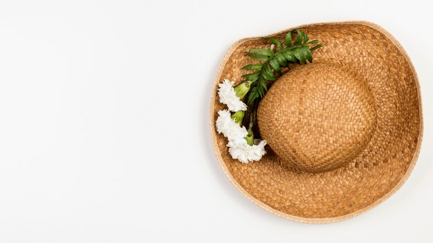 Top view summer hat with flowers