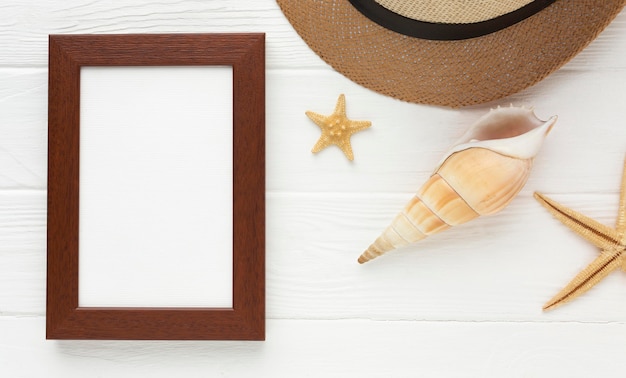 Top view summer hat with frame on the table