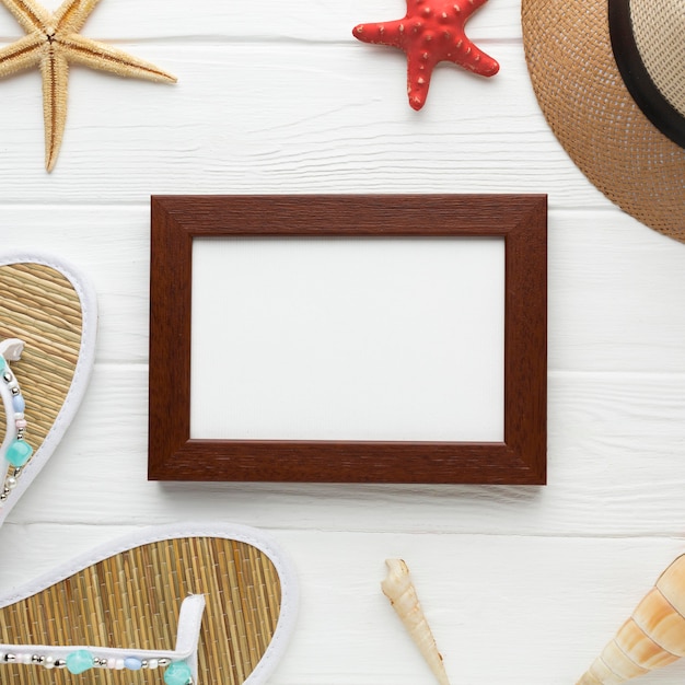 Top view summer hat with frame on the table