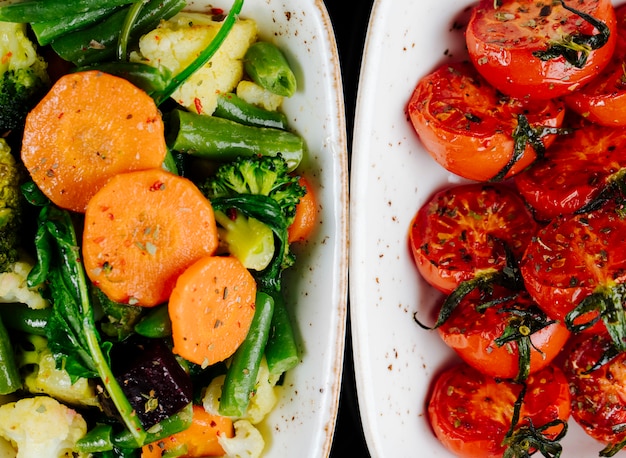 Top view sun-dried tomatoes with stewed vegetables carrots asparagus with broccoli