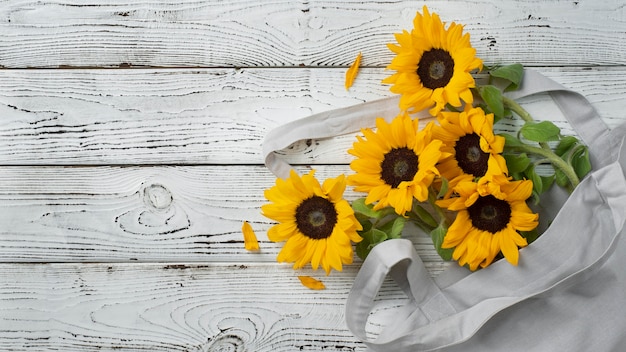 Free photo top view of sunflowers frame with copy space