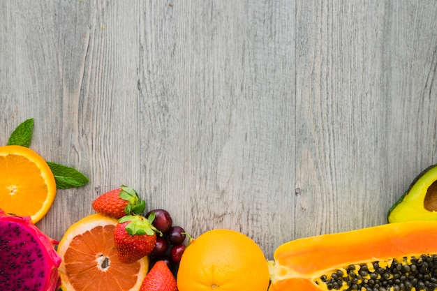 Top view of surface with appetizing fruits for summer