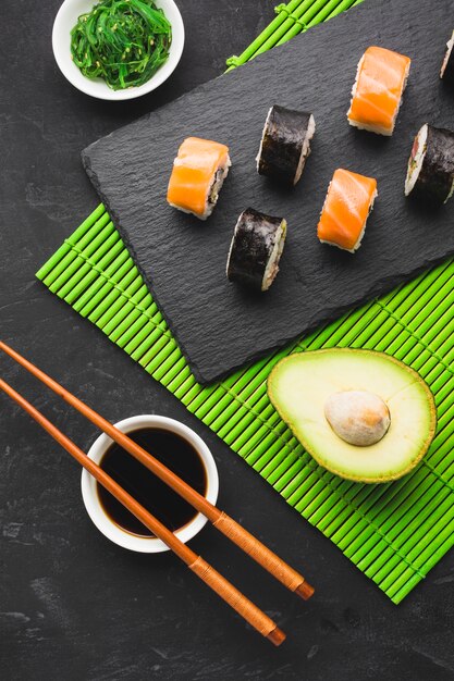 Top view sushi plating on bamboo mat