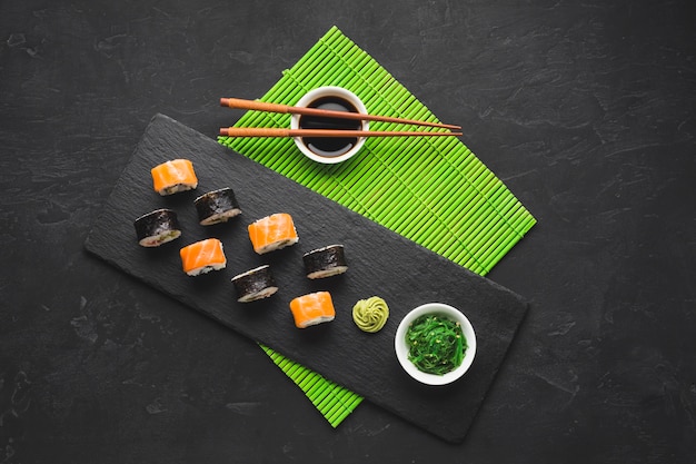 Top view sushi plating on bamboo mat