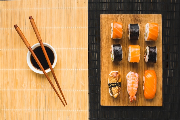 Top view sushi plating on bamboo mat