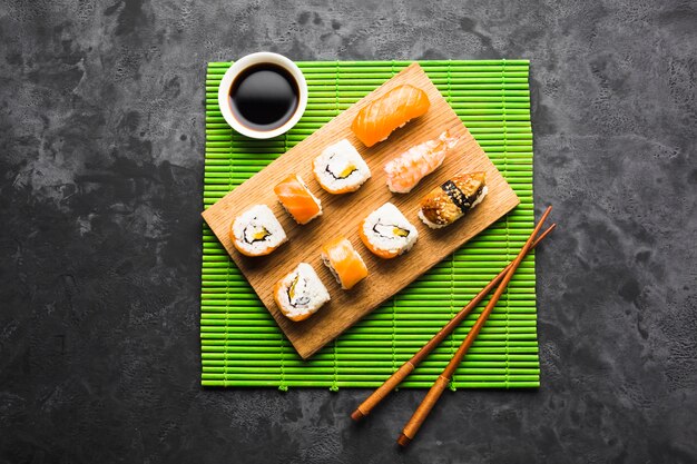 Top view sushi plating on bamboo mat