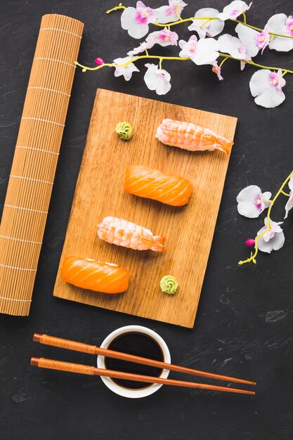 Top view sushi plating and sakura flower