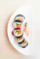 Free photo top of view sushi roll