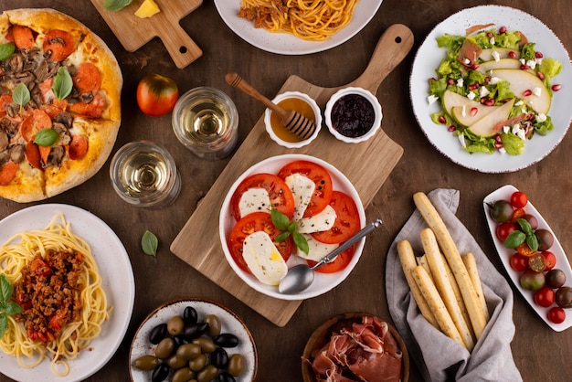 Free photo top view table full of delicious food assortment