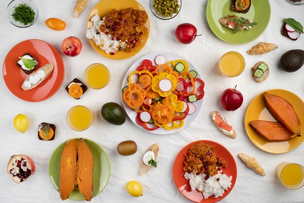 Top view on table full of various types of food