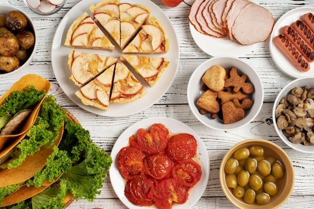 Top view on table full of various types of food