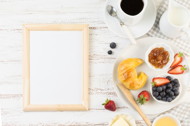 Top view tasty breakfast with board