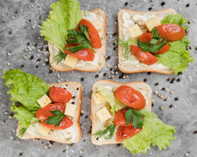 Free Photo top view tasty bruschettas on table