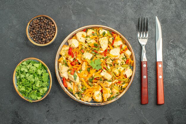 Top view tasty chicken salad with vegetables