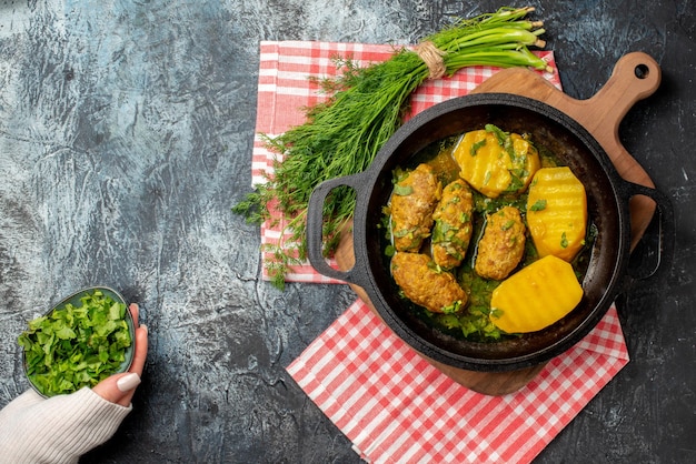 Free Photo top view tasty meat rissole with boiled potatoes and greens on a gray background color salad cooking food kitchen meal dinner