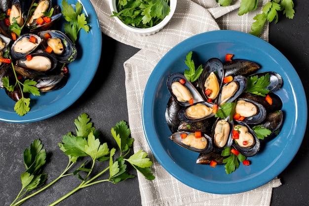 Free Photo top view tasty mussels with parsley