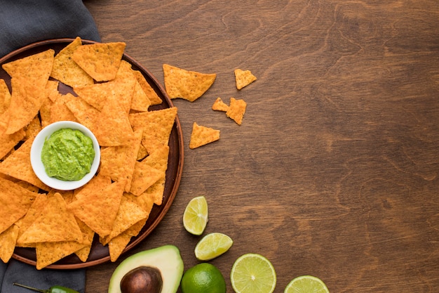 Top view tasty nachos with fresh guacamole