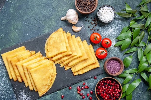 Top view tasty pancakes on blue background cake pastry meat sweet breakfast dough color pie bake