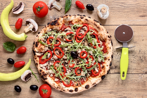 Free Photo top view tasty pizza on wooden background