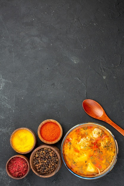 Free Photo top view tasty soup with different seasonings on the grey background soup meal food meat seasoning spicy