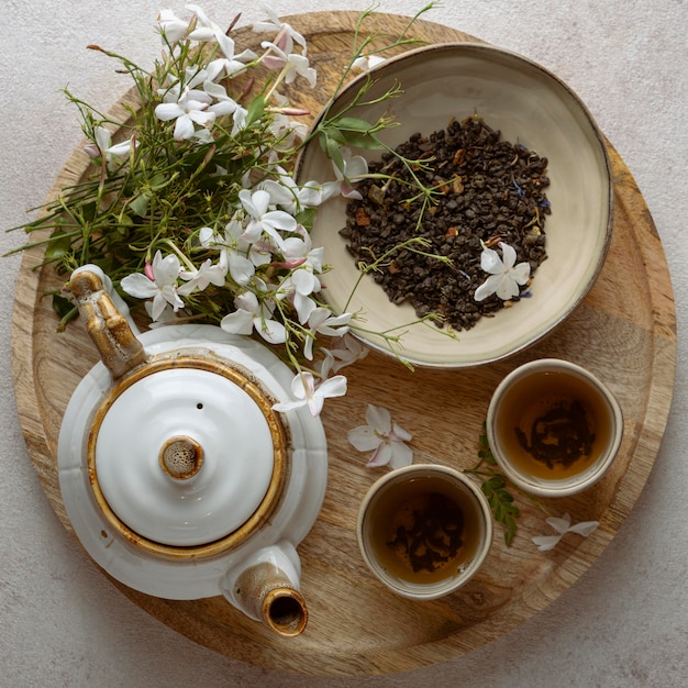 Top view tea cups and flowers